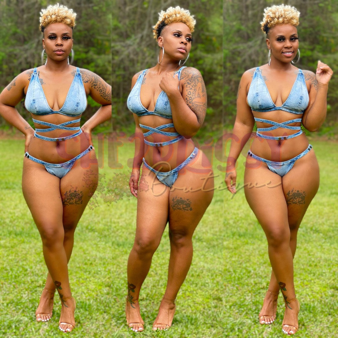 Who would’ve thought jeans x swimwear would look this good! Pack this sexy 2 piece jean bikini in your suitcase! Wide thong style bottom with button closures and adjustable straps on the matching jean bra.